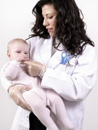 Health professional and a baby